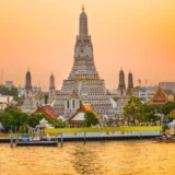 Temple of Dawn or Wat Arun in Bangkok at Sunset "bangkok pattaya tour package"